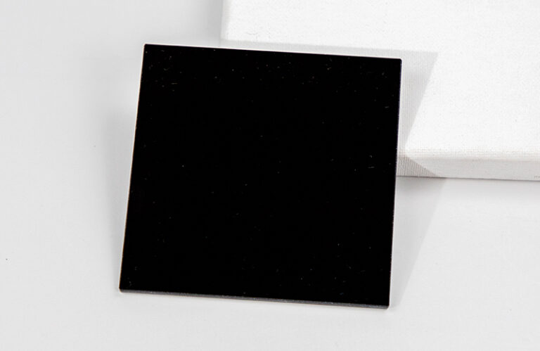 UV Transmissive Visible Absorbing Glass