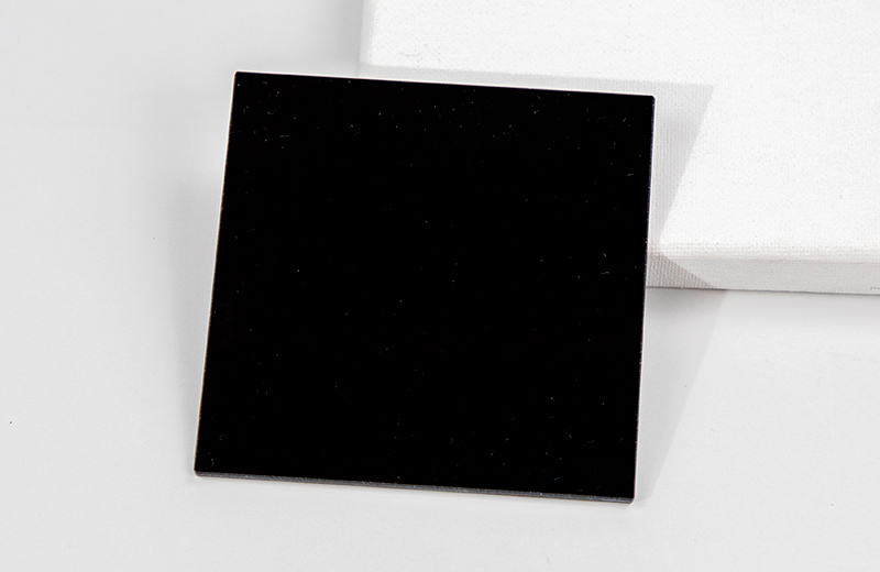 UV Transmissive Visible Absorbing Glass